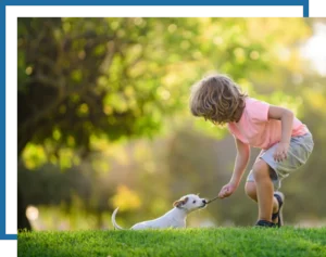 child playing in a beautiful lawn. Mow Pros lawncare services, irrigation, tree trimming